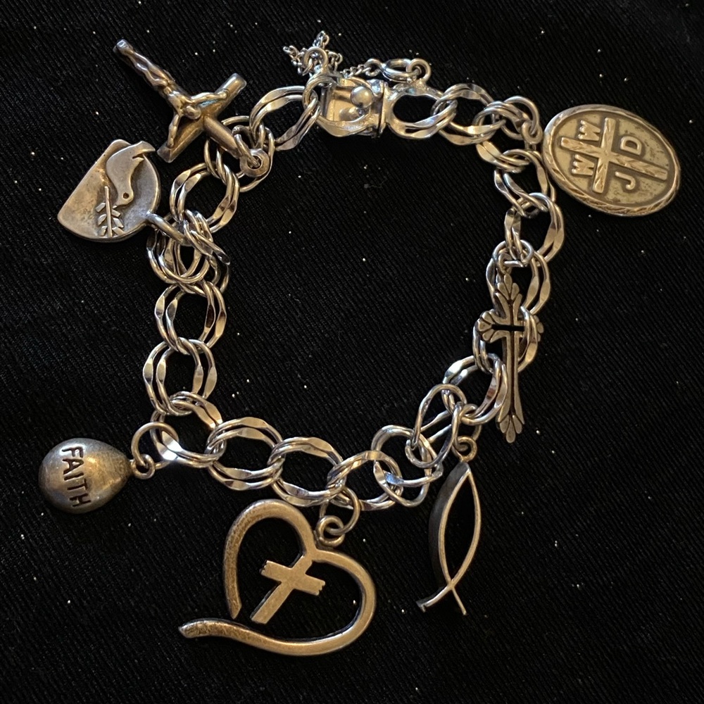 Lovely Christian themed sterling silver charm bracelet